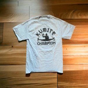 "Bloodsport" Kumite 1988 Champion Light Blue T-Shirt, Women's Small